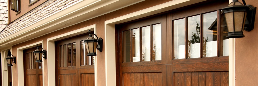 Image of a luxury home with three garage doors